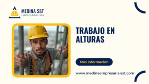 Trabajador de construcción con casco y arnés de cuerpo entero asegurado a una línea de vida vertical mientras sube un andamio